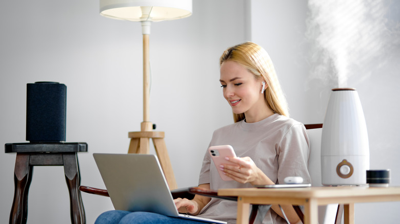 Woman enjoying her humidifier 