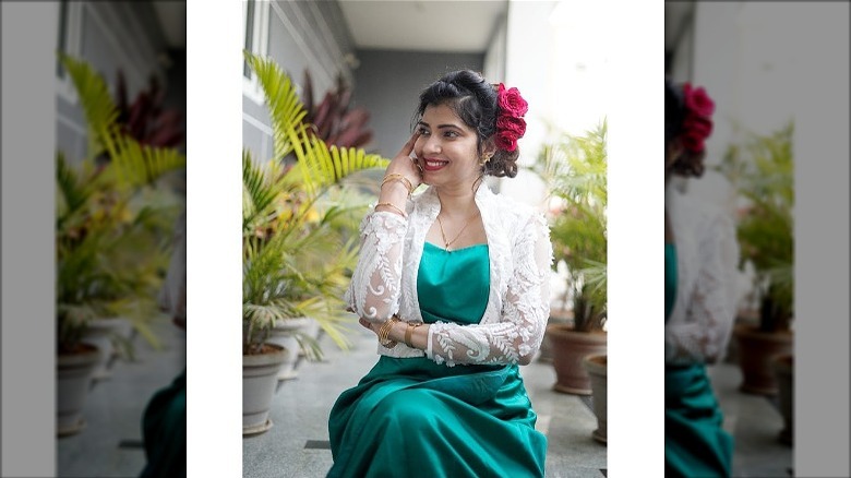 female blue dress with lace shrug