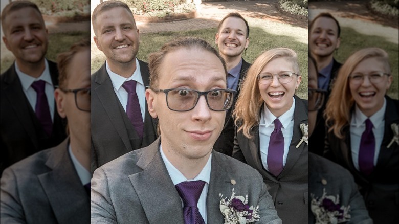 a wedding party in suits
