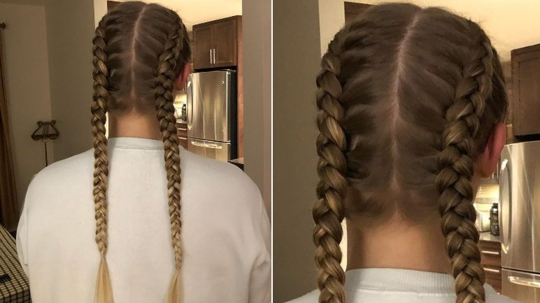 Woman models Dutch braid pigtails