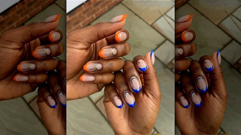 woman with mismatched day night manicure