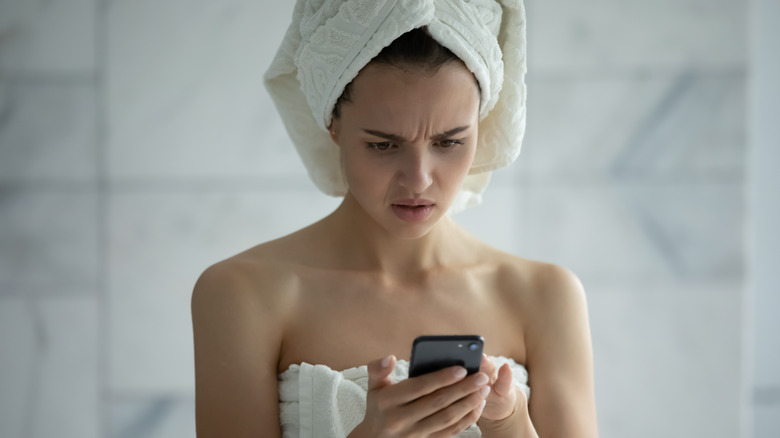 annoyed texting woman