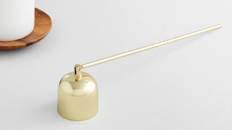 candle snuffer in brass