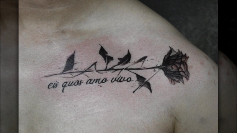 rose and thorns collarbone tattoo