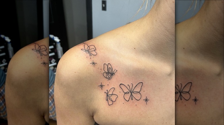 linework butterflies collarbone tattoo