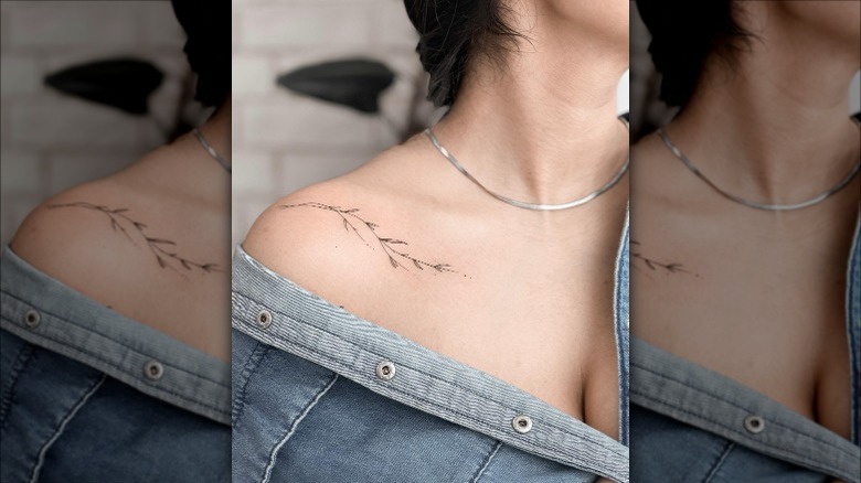 woman with leafy collarbone tattoo
