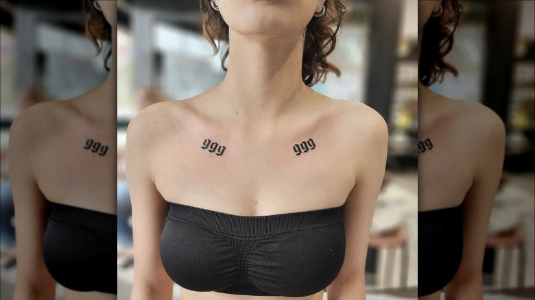 woman with numbers collarbone tattoo
