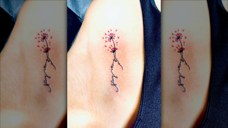 script flower collarbone tattoo