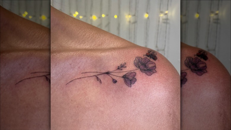 flower and bee collarbone tattoo
