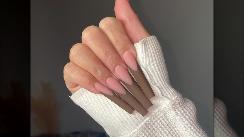 Long brown French manicure