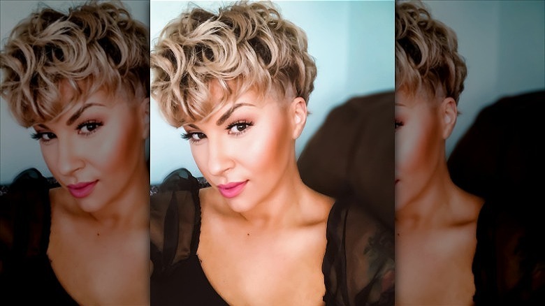 woman with short curly pixie cut