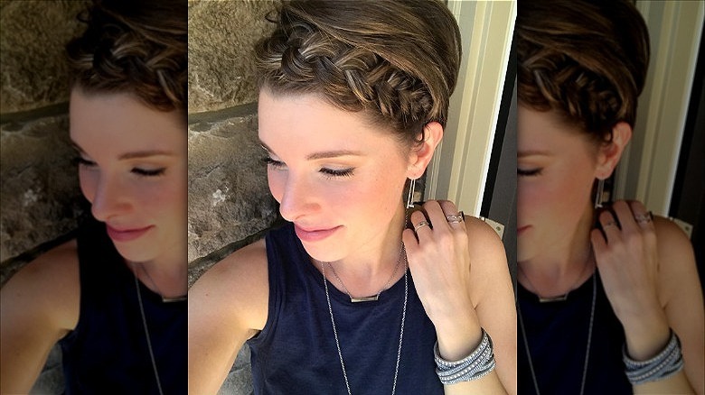 woman with short braided bangs