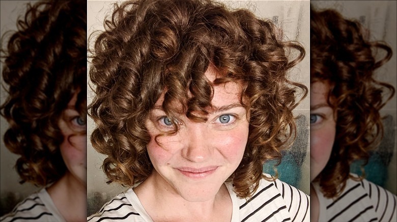 woman with short curly bob