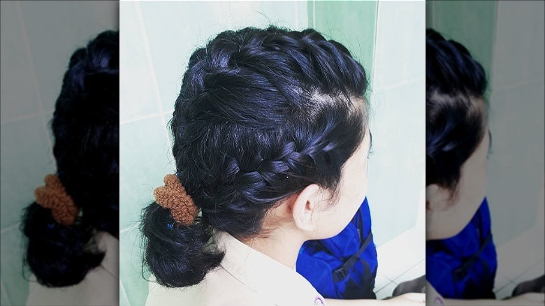 woman with short french braids hair