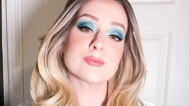 Woman wearing blue eyeshadow