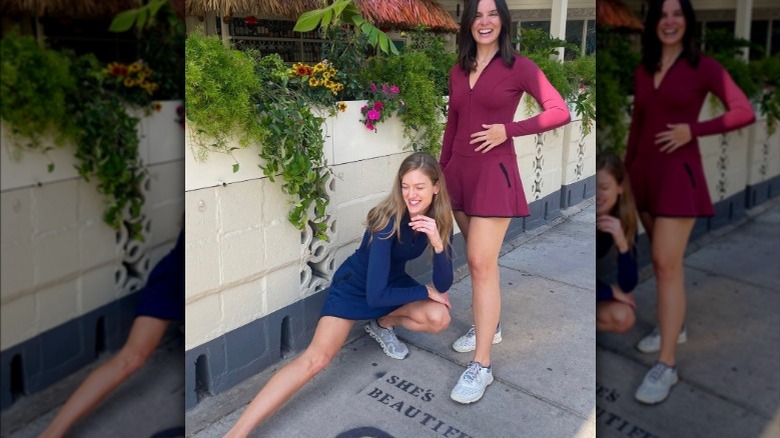 Two women in activewear dresses