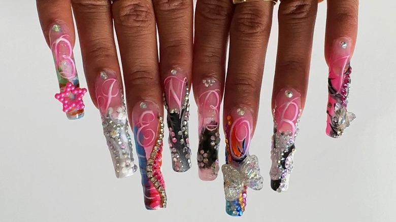 Woman with maximalist long nails