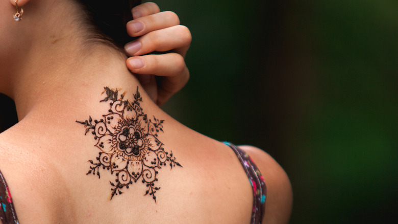 Woman with mandala tattoo