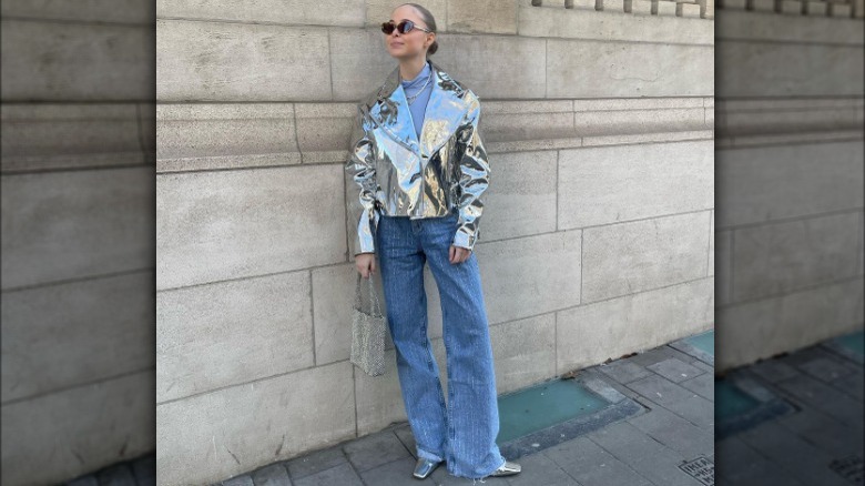 Woman in silver metallic jacket