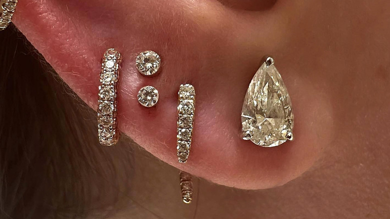 multiple diamond ear piercings