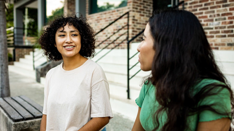 Two women talking