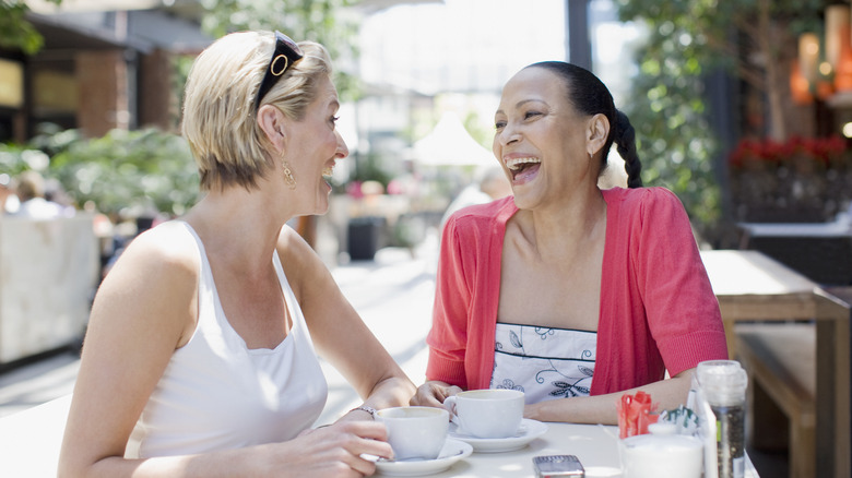 Two women laughing