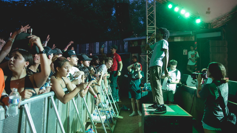 Fans against barricade