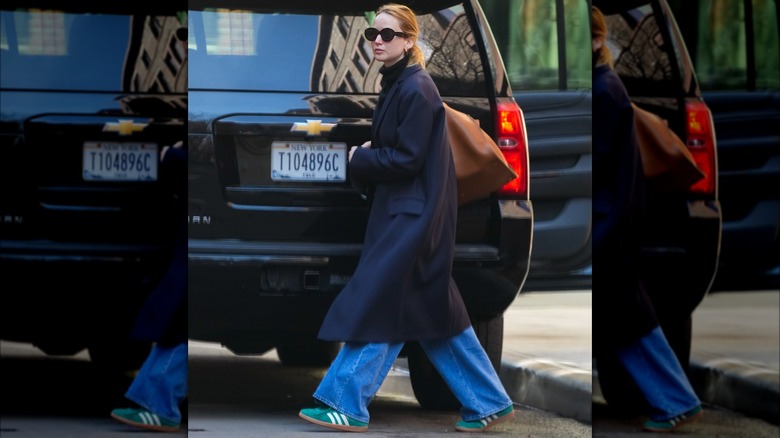 Jennifer Lawrence wearing green Adidas sneakers