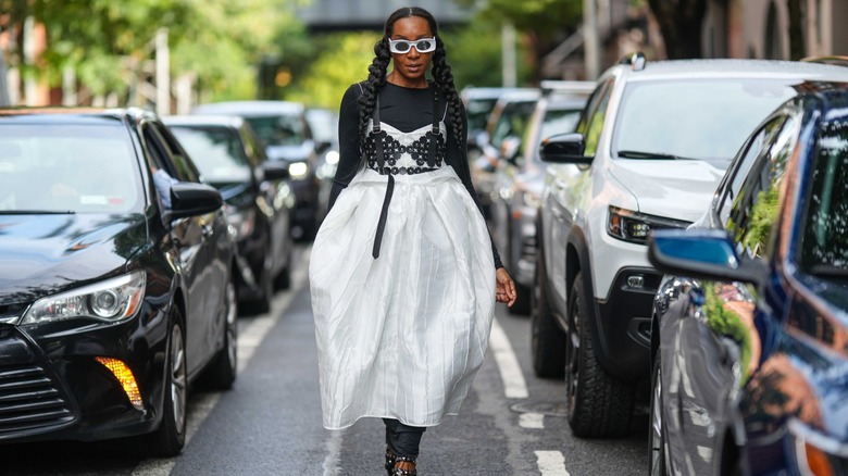 Woman wearing dress over top