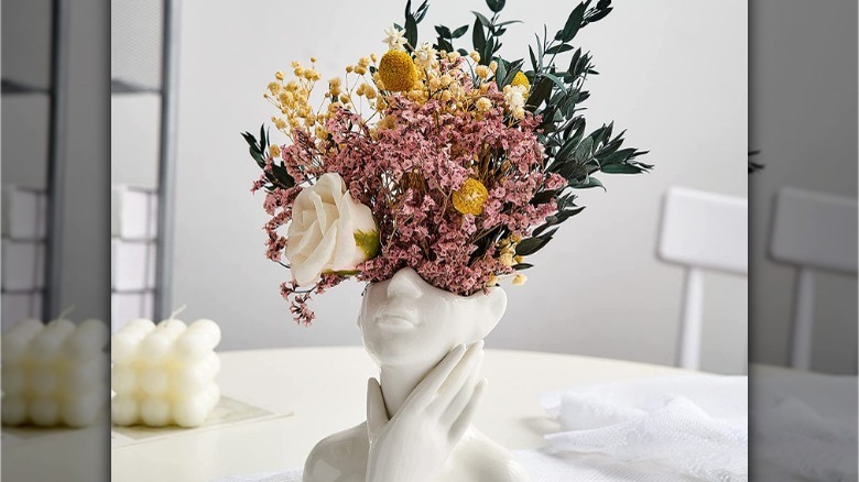 modern vase with flower bouquet