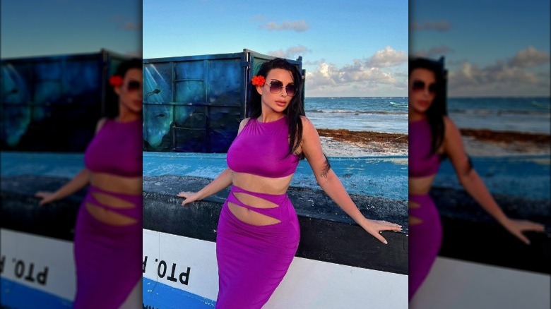 Woman wearing purple cut-out