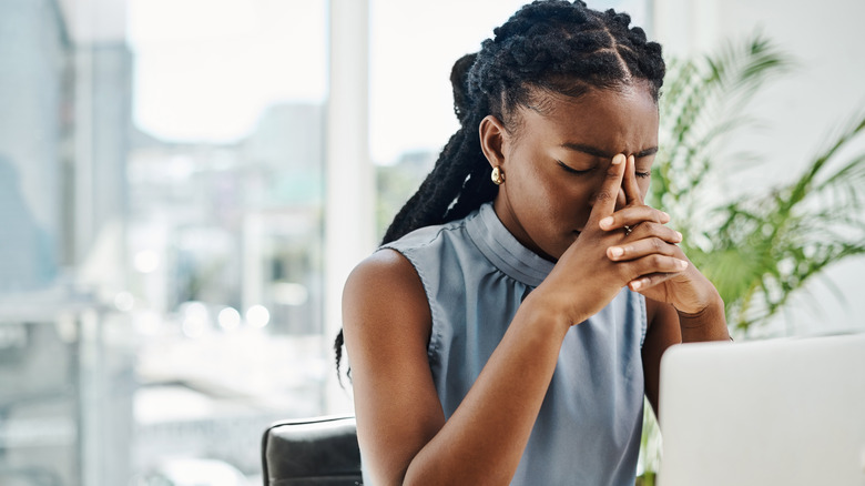 stressed woman at work