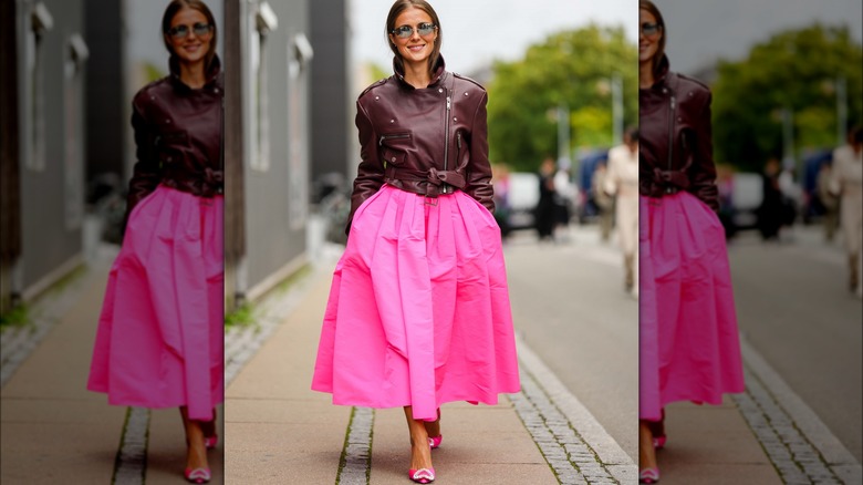 Woman in jacket pink skirt