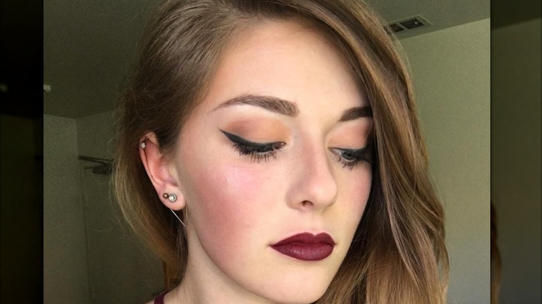 Woman with burgundy lipstick