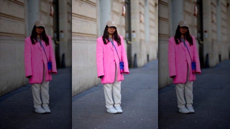 woman wearing bright pink coat