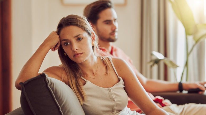 Woman turning away from boyfriend