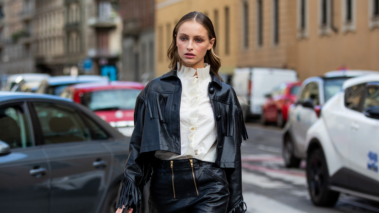 woman with tucked in blouse