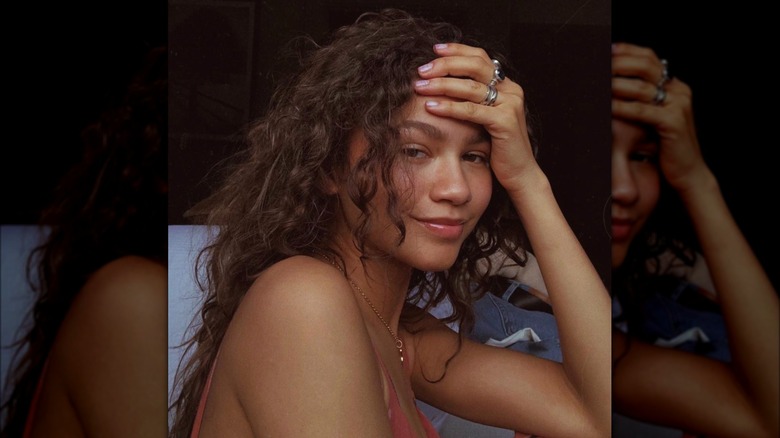 Zendaya posing makeup-free