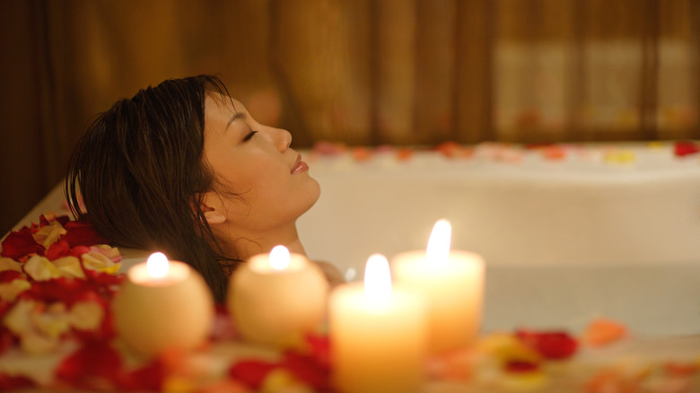 woman taking a relaxing bath 