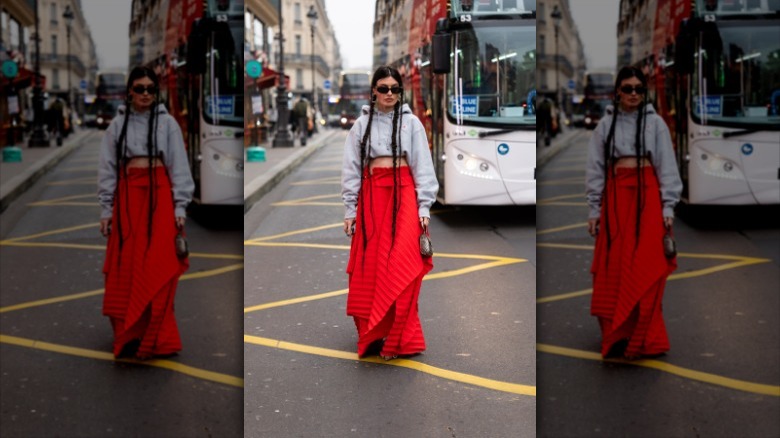 woman wearing red maxi skirt