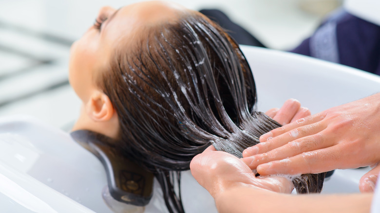 woman having hair treatment