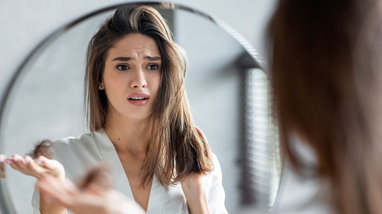 woman with missing clump of hair