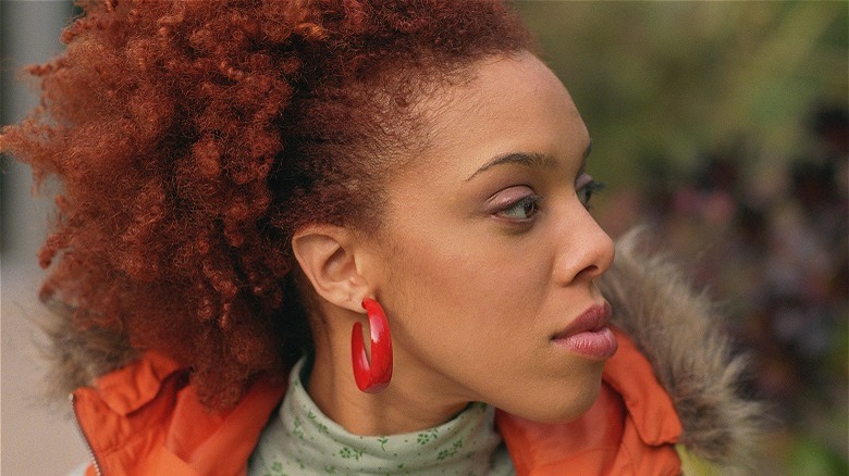 Close up of woman with curly red hair