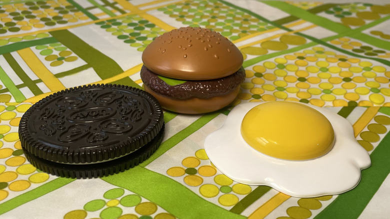 Novelty lip glosses on tablecloth