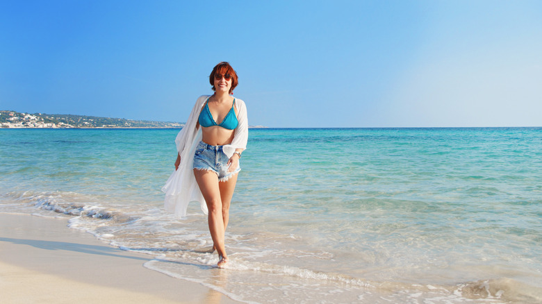 woman on beach with kimono 
