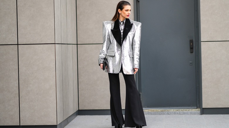 woman wearing metallic blazer