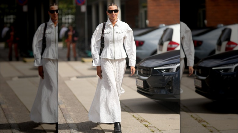 woman wearing white denim jacket