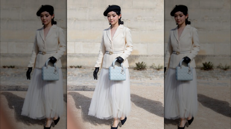 woman wearing cream blazer