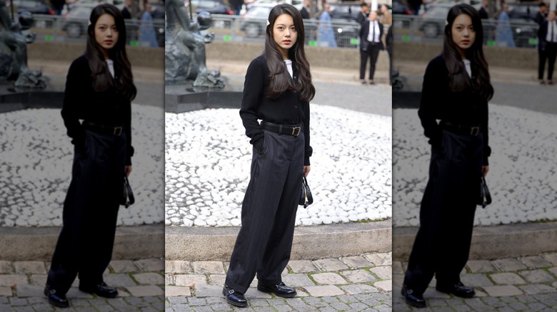 Woman in black cardigan