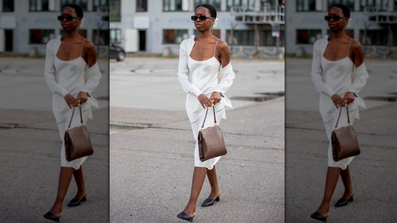 Woman in white slip dress